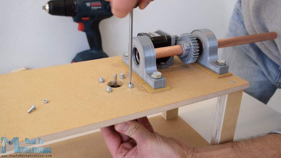 securing the feeder motor