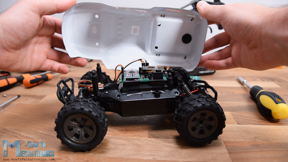 Installing the custom-build Arduino RC receiver on the RC car model