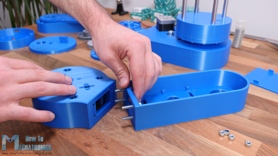 Connecting the two parts of the Arm number 1 using four M5 bolts