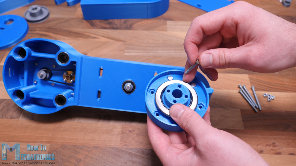 Inserting 25mm M4 bolts in the second joint coupler