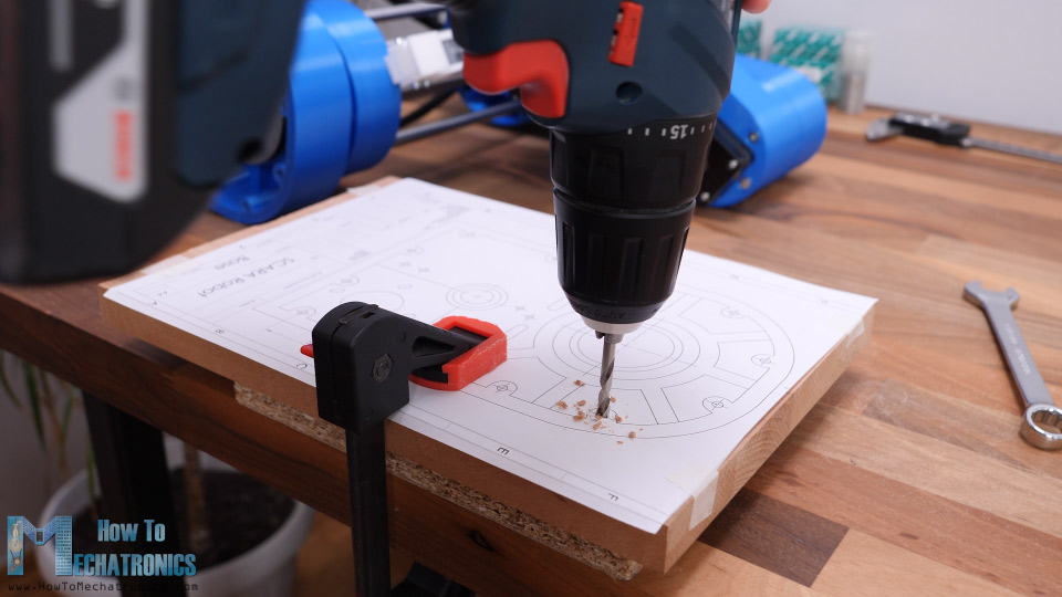 Preparing the wooden base for the robot