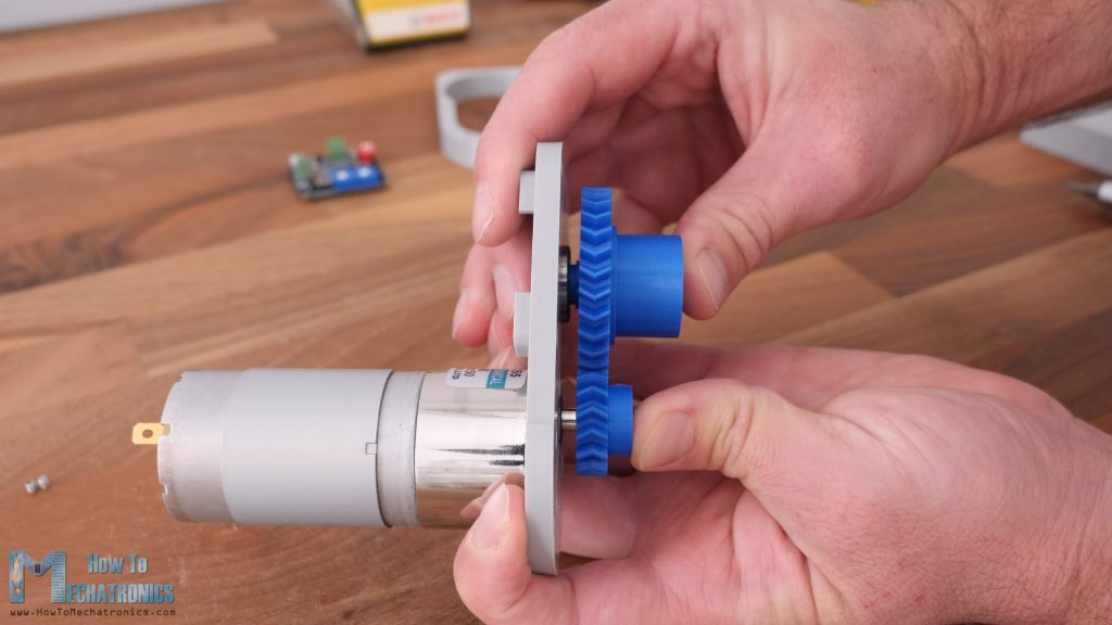 Inserting the herringbone gears in place - sliding both of them at the same time