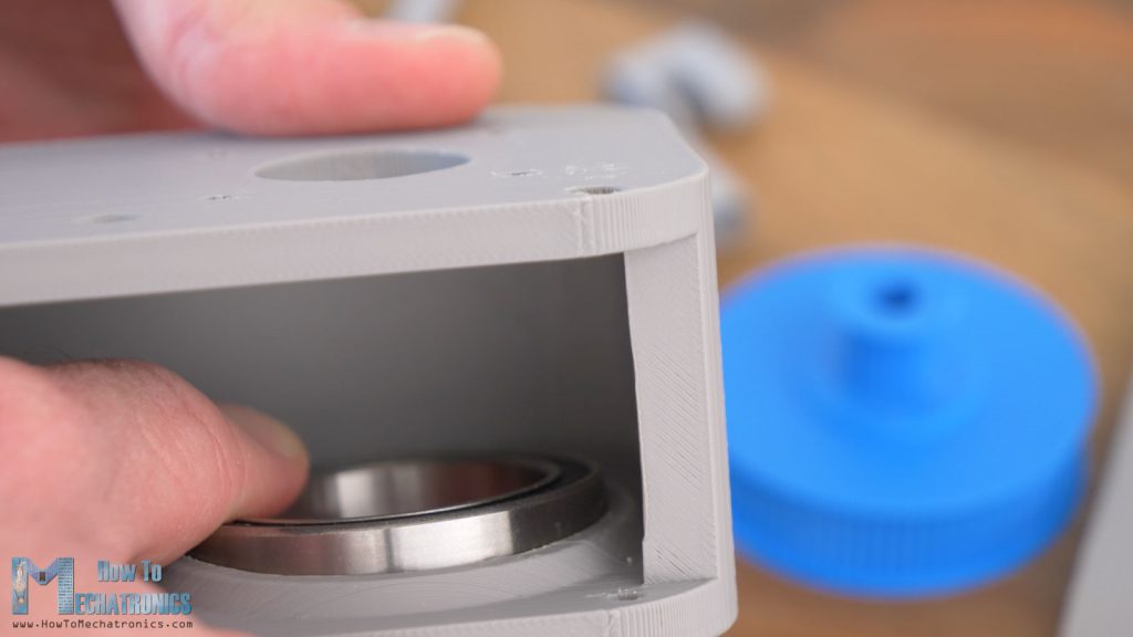 Inserting a ball bearing into the belt drive housing