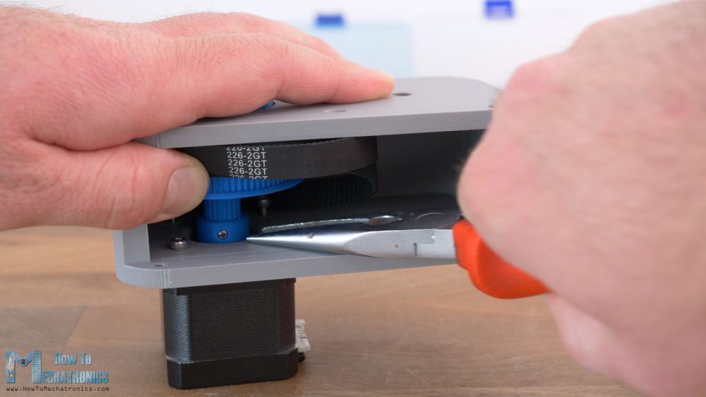 Securing the NEMA 17 stepper motor to the belt drive housing