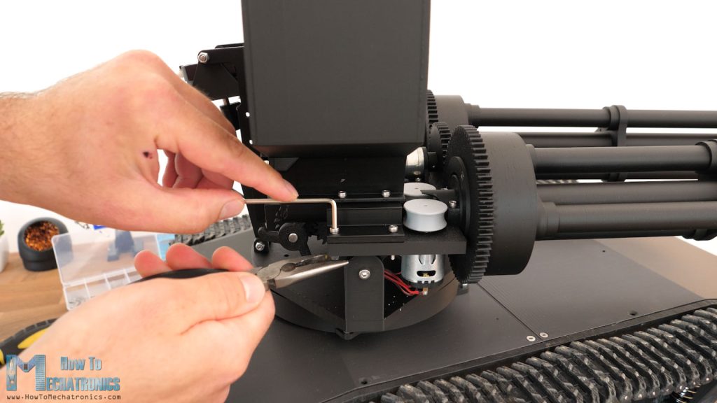 Securing the nerf darts magazine to the tilt platform